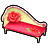 赤バラのソファの画像